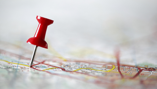 map with a pin in it map with a pin in it