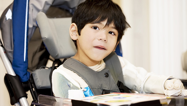 Boy sat in a wheelchair