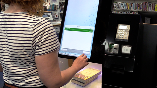 person using library computer