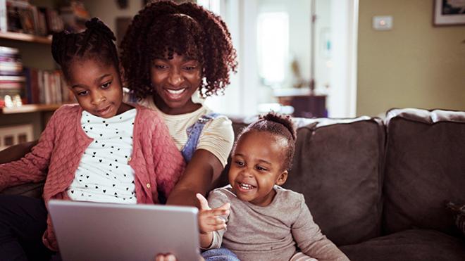 Mother and daughters doing a video call