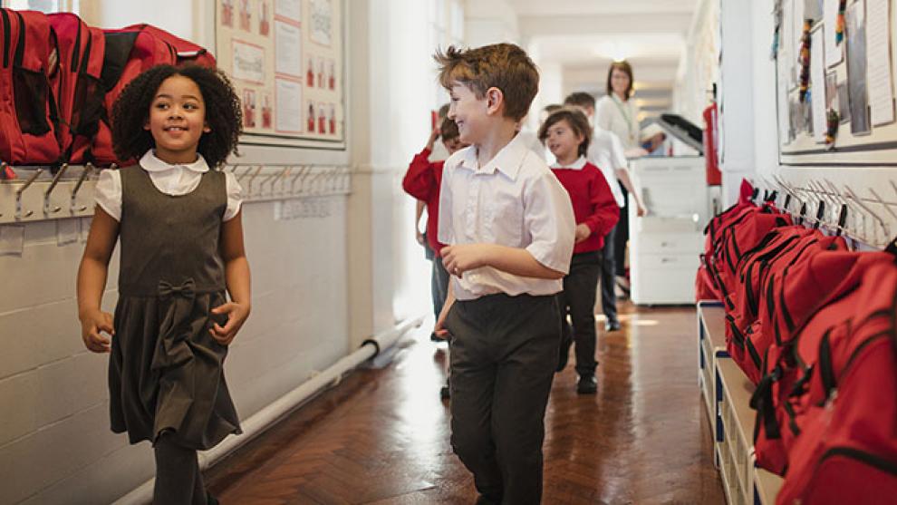 School children in classroom corridor Schoolchildren in classroom corridor