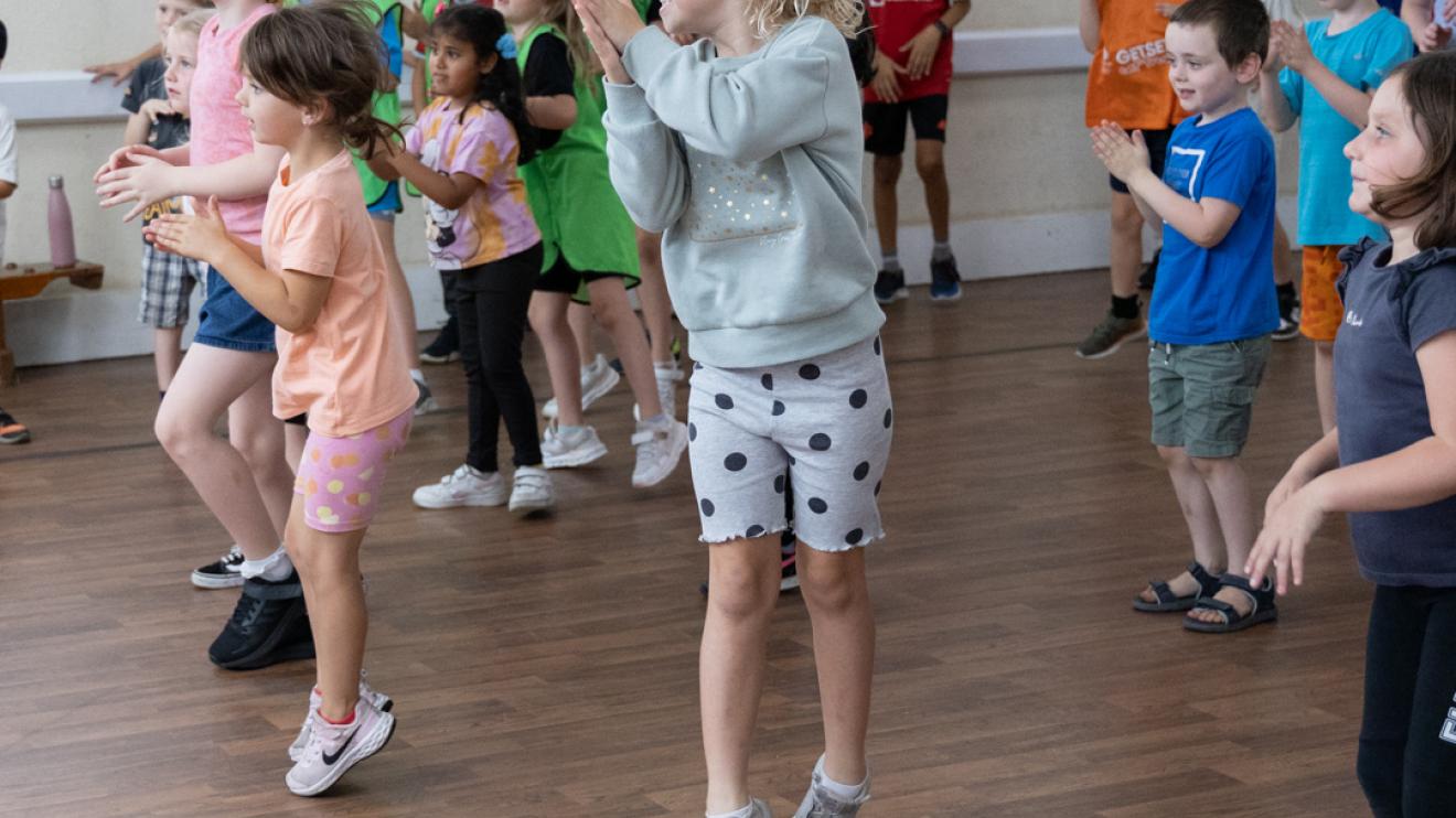 Group of children dancing happily