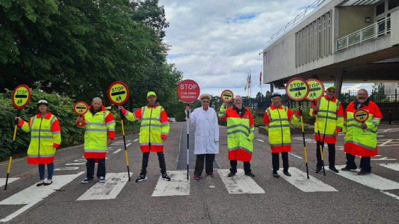 School crossing patrol team celebrating seventy years