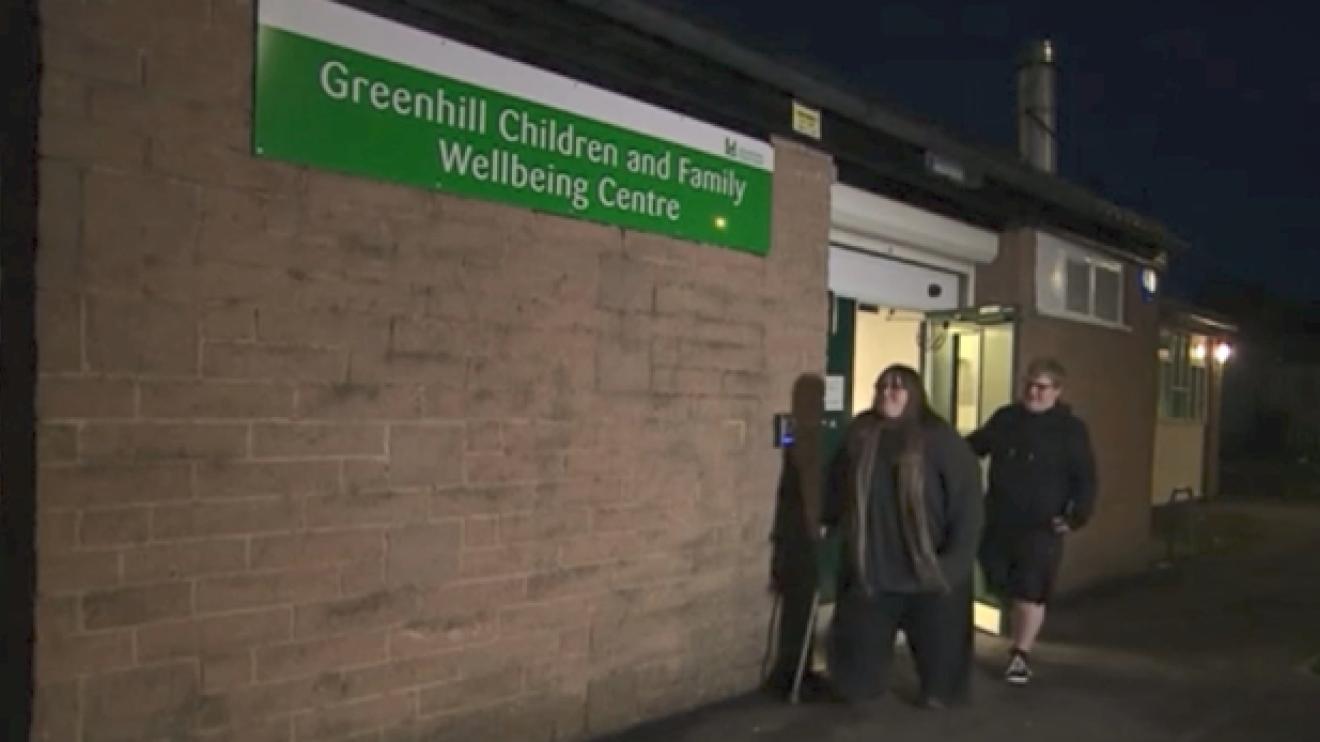 Charlie and his mum leaving Greenhill Children and Family Wellbeing Centre