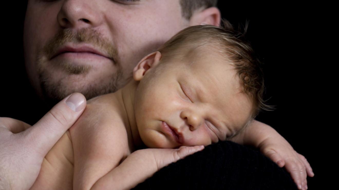 Baby on a man's shoulder Baby on a man's shoulder