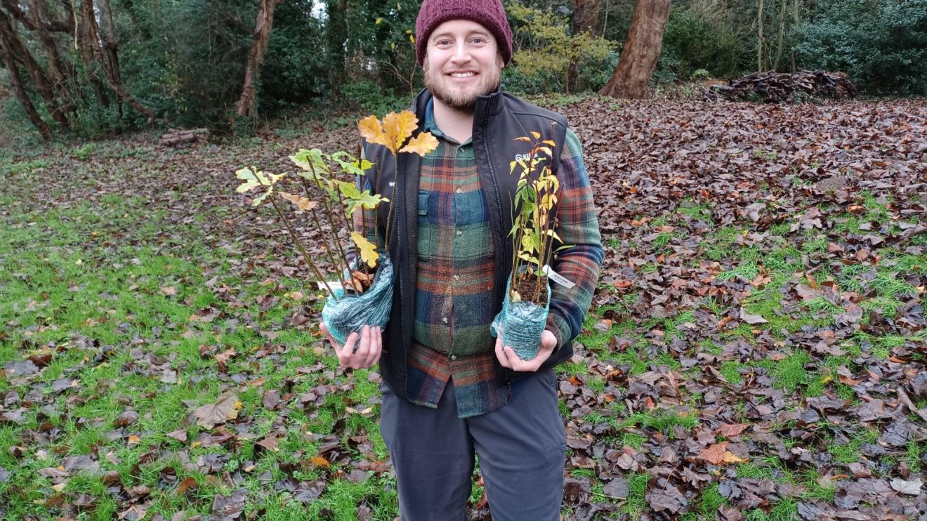 Jack Starbuck from the Woodland Trust with small trees