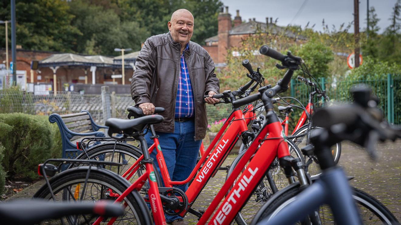 Ozzy O'Shea with a selection of e-bikes