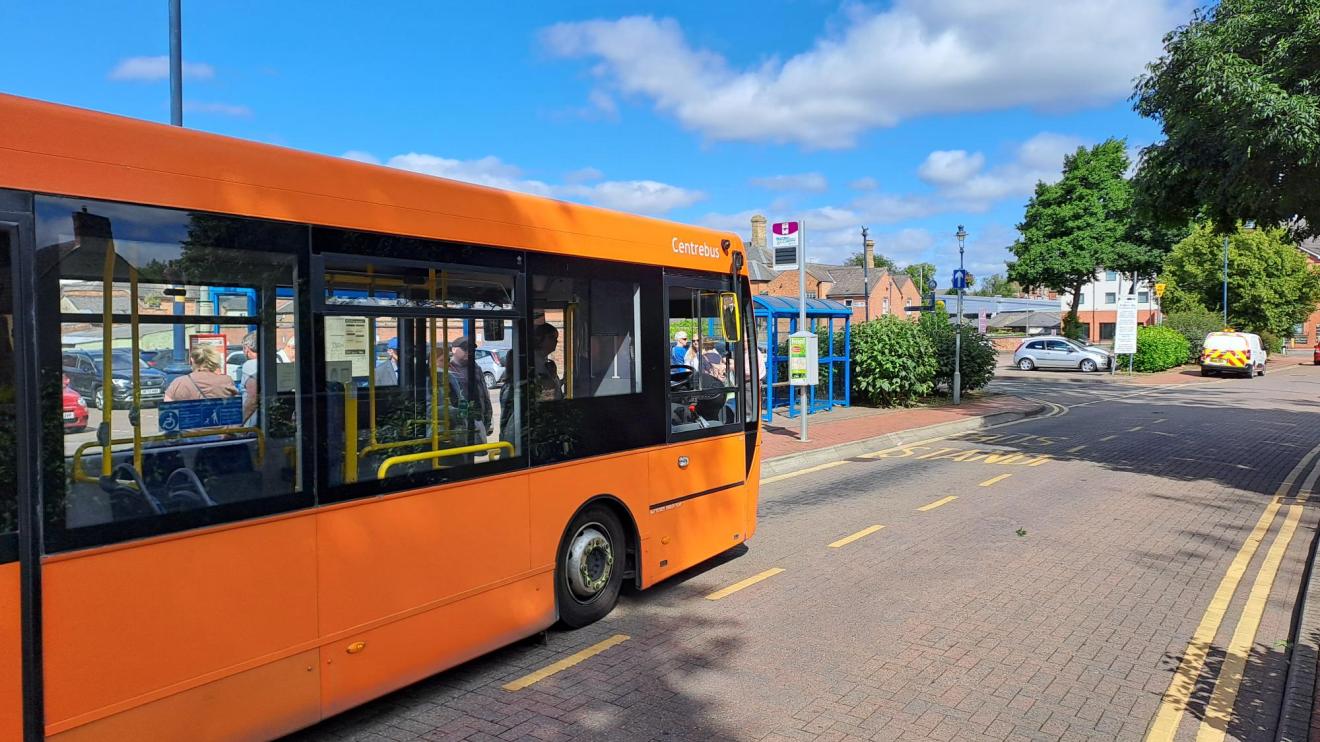 A Centrebus-branded bus at a bus stop in Leicestershire