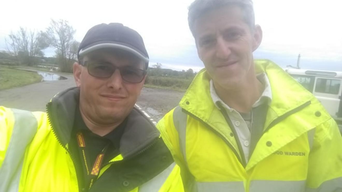 Two men in high-vis jackets