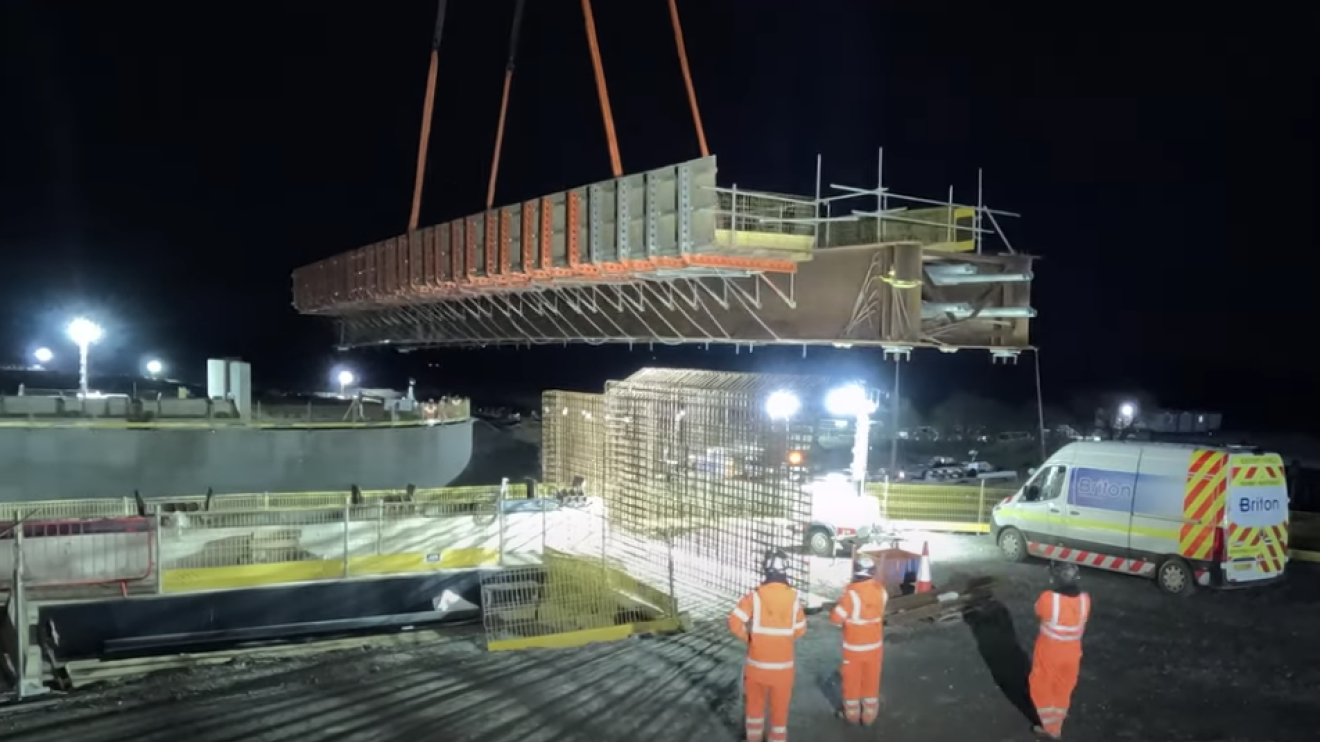 rail bridge being lifted into place
