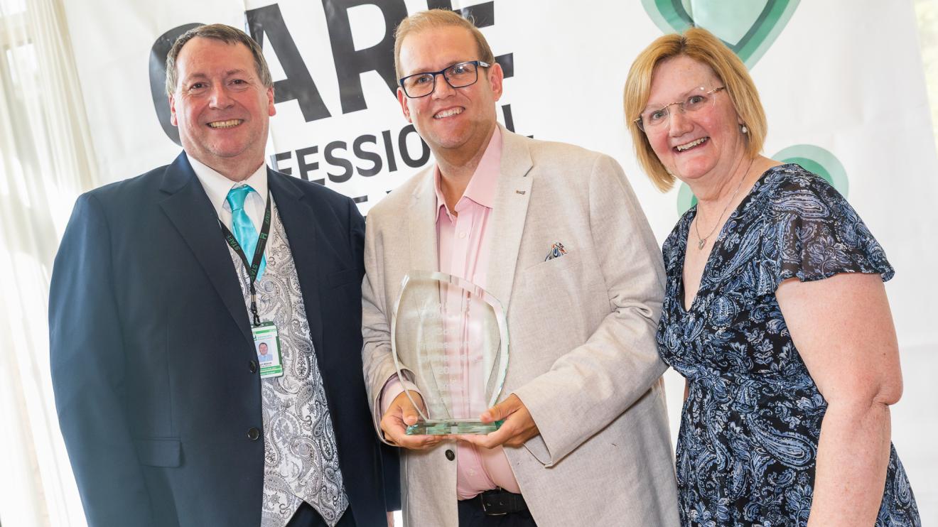 The winner of the Care Professional of the Year award with Cllr Carl Abbott