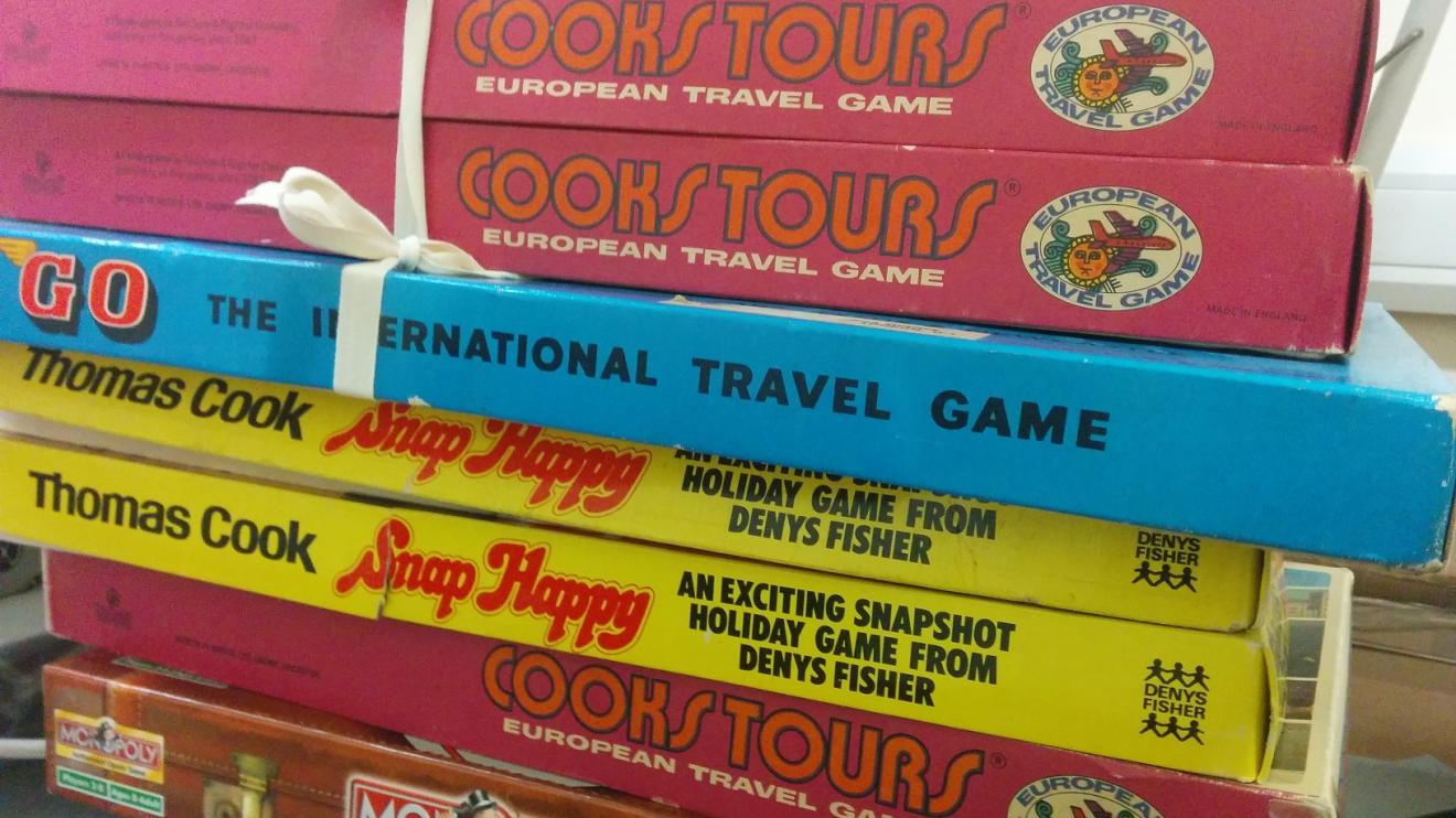 Picture of stack of Thomas Cook board games