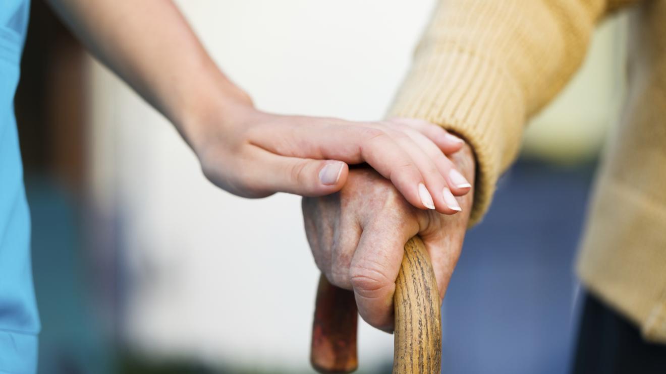 a person using a walking stick