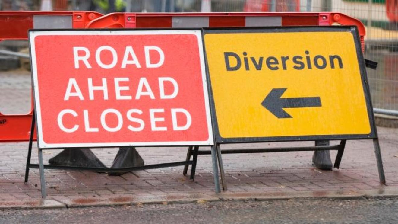 Signs showing road closure and diversion