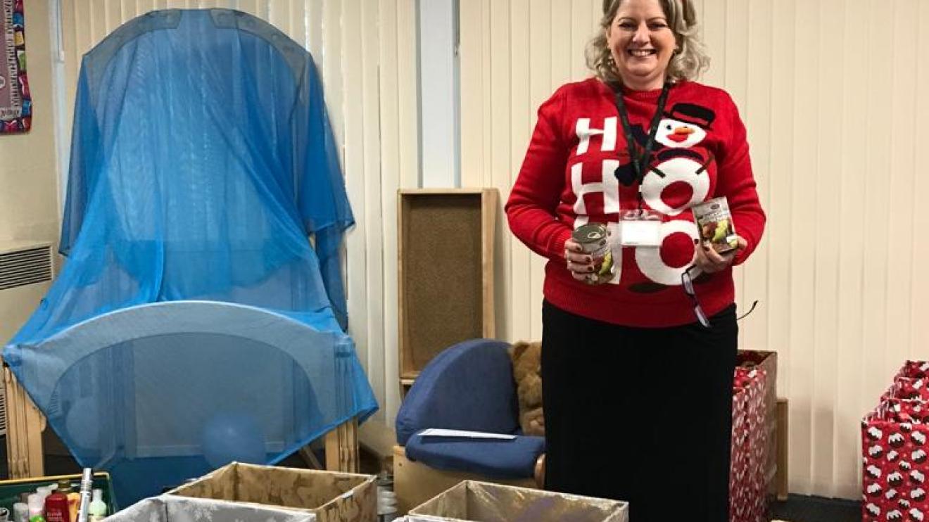 Cllr Deborah Taylor helping to put the hampers together 
