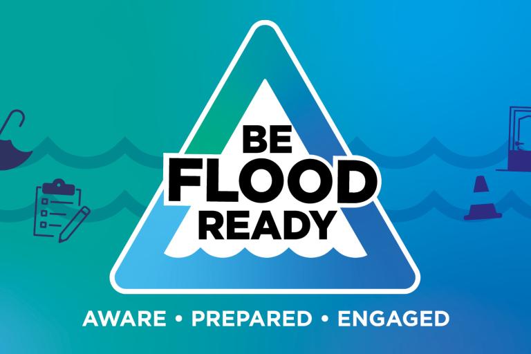 Blue and green graphic with a triangle and the words 'Be flood ready' inside