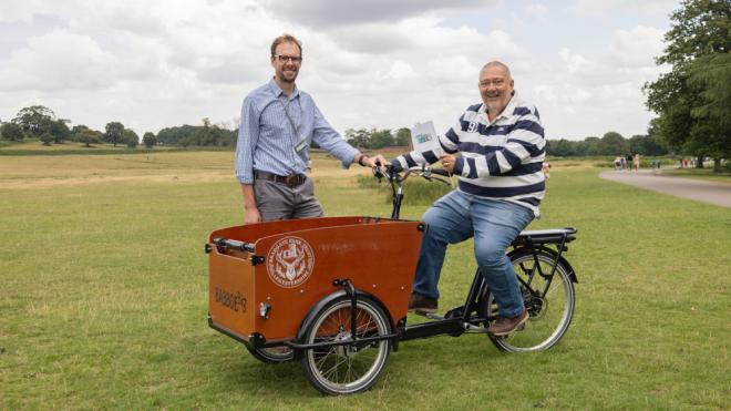 Councillor Ozzy O'Shea and and James Dymond with the electric cargo bike
