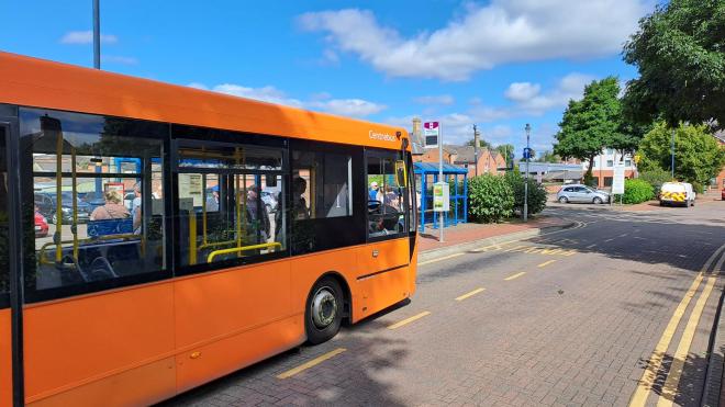 A Centrebus-branded bus at a bus stop in Leicestershire