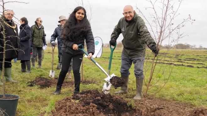 Girl and Lord-Lieutenant planting a tree