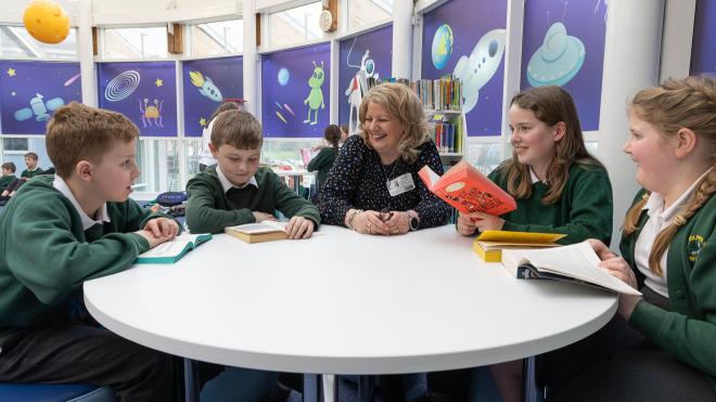 Councillor Deborah Taylor and St Botolph's pupils in the school's space-themed library
