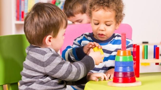 young children playing childcare