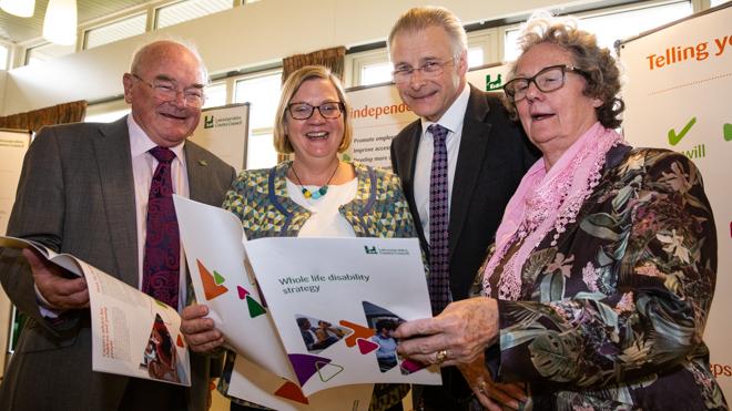 Four people at the launch of the Whole Life Disability strategy