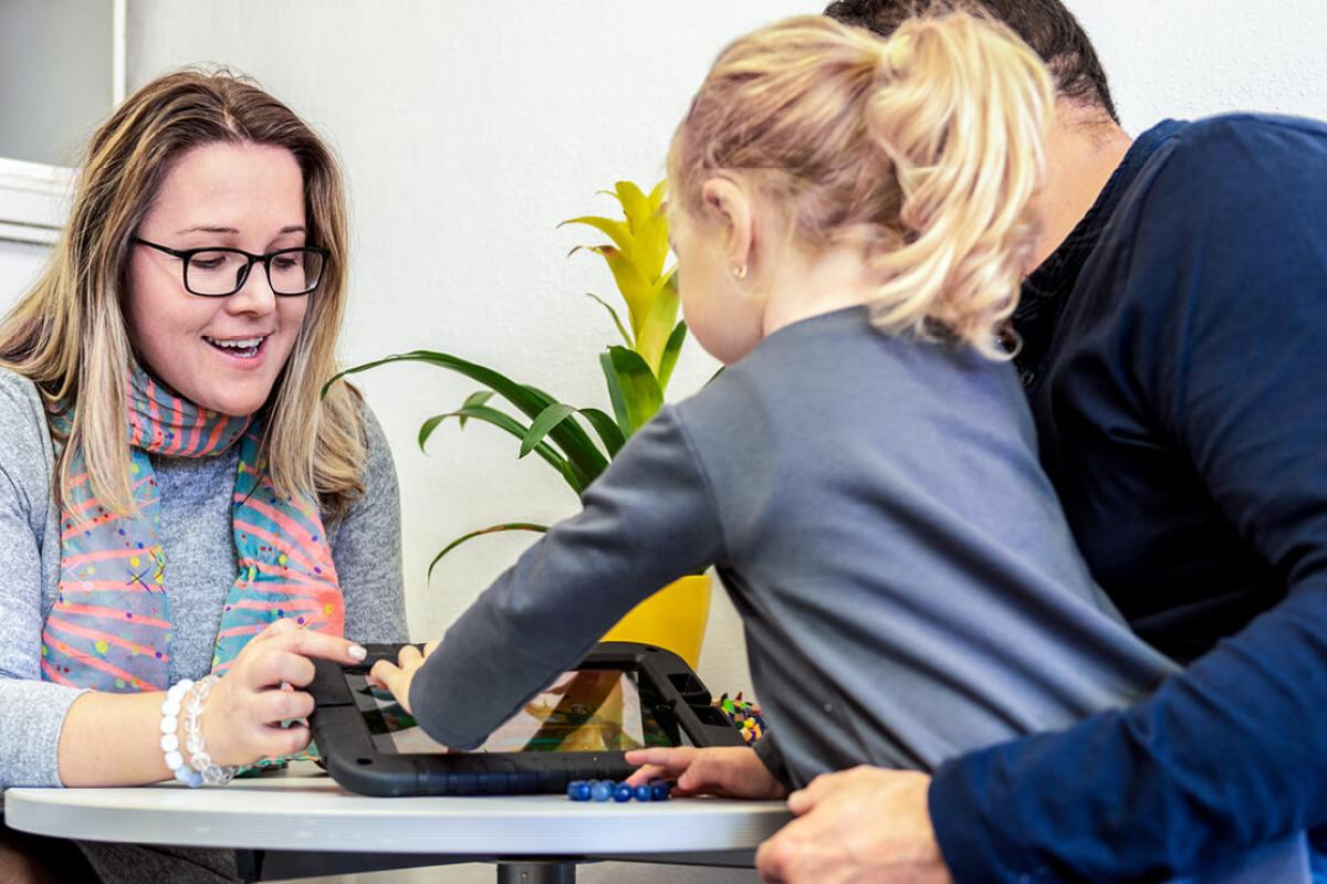 Social worker interacting with a child