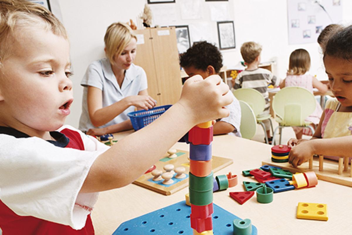 Early years children playing in nursery