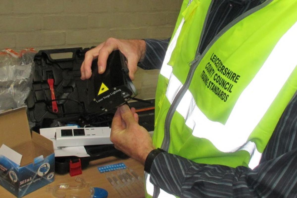 A Trading Standards Officer inspecting product safety