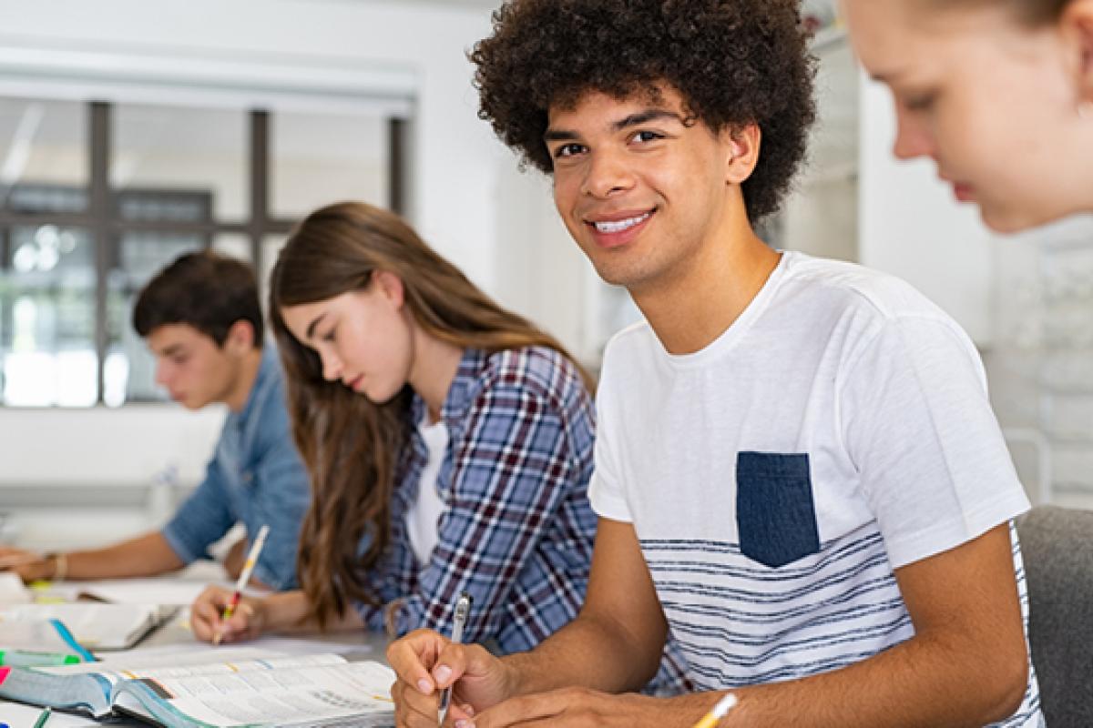 A teenager doing school work