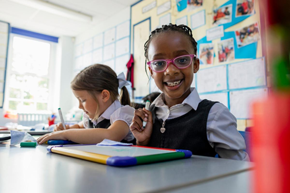 A young child doing school work