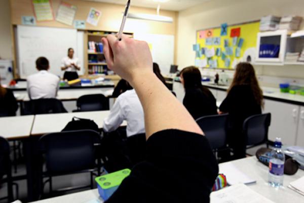 A teacher taking a lesson in a classroom