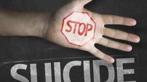 Hand illustrating stop suicide pledge